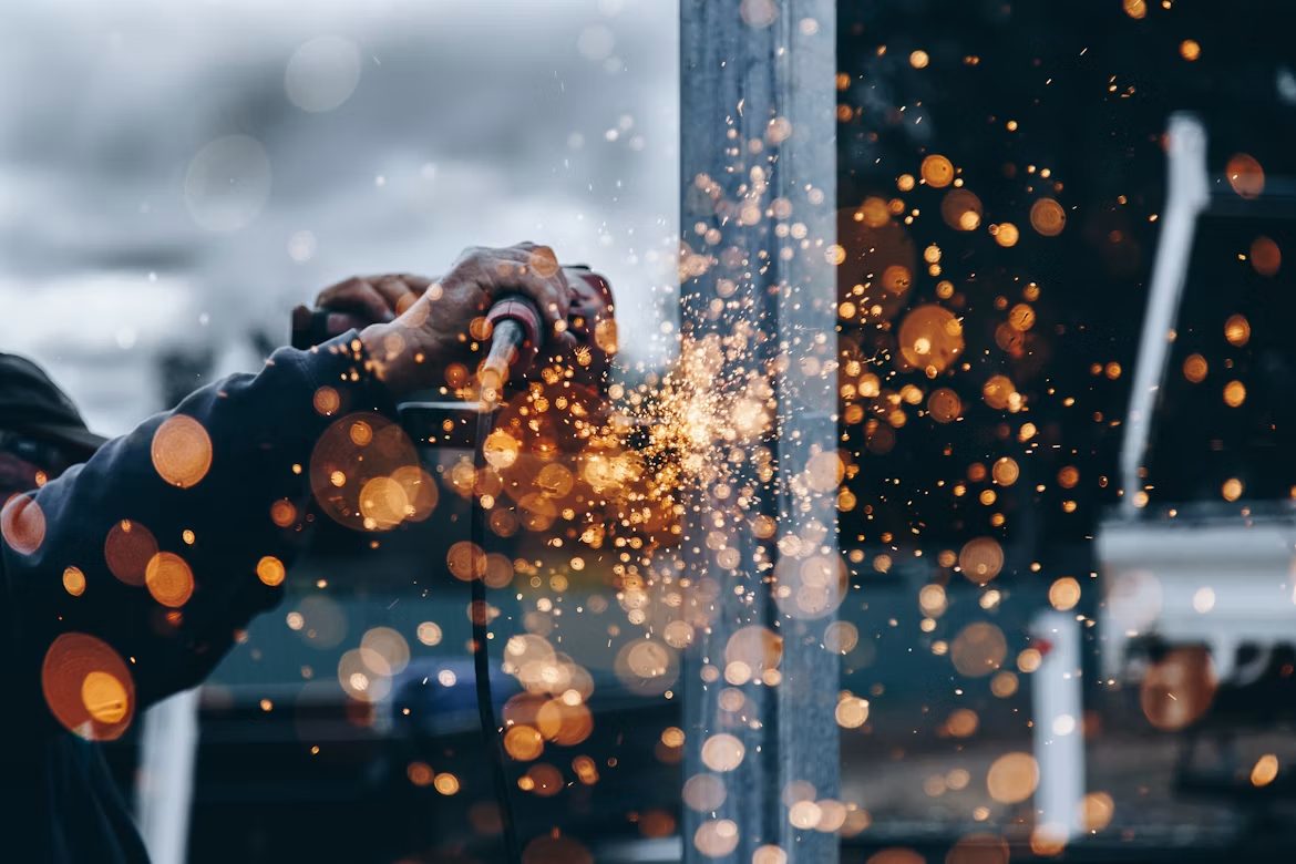 Metal fabrication sending up sparks